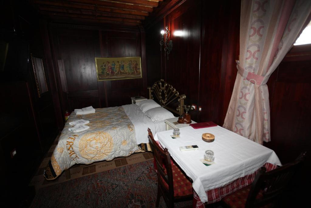 Postel nebo postele na pokoji v ubytování Hotel Iliada