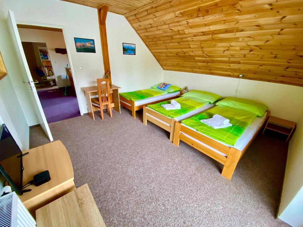 Postel nebo postele na pokoji v ubytování Apartments Lipno Serafin