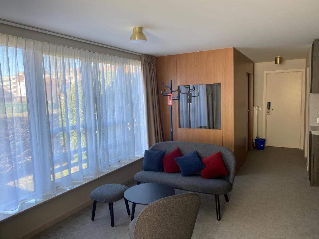 Posezení v ubytování Studio-Hotel Apostroff