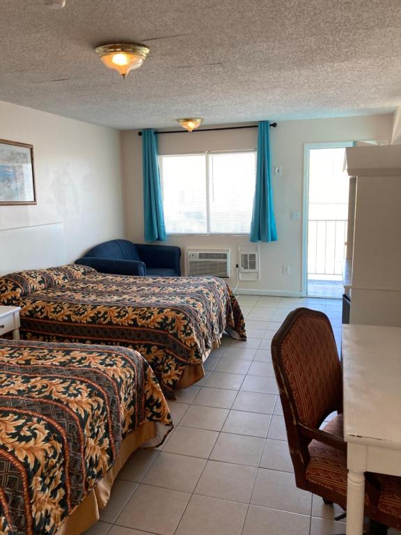 Postel nebo postele na pokoji v ubytování Surfside Motel - Seaside Heights