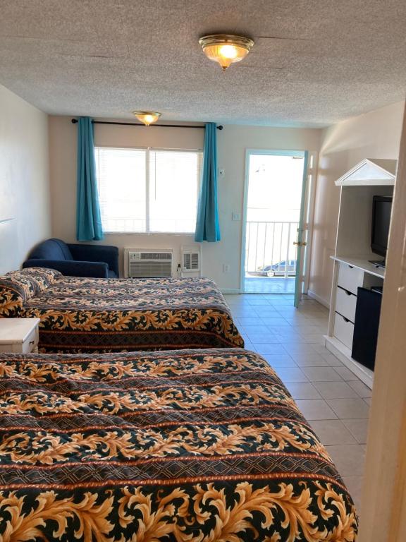 Postel nebo postele na pokoji v ubytování Surfside Motel - Seaside Heights