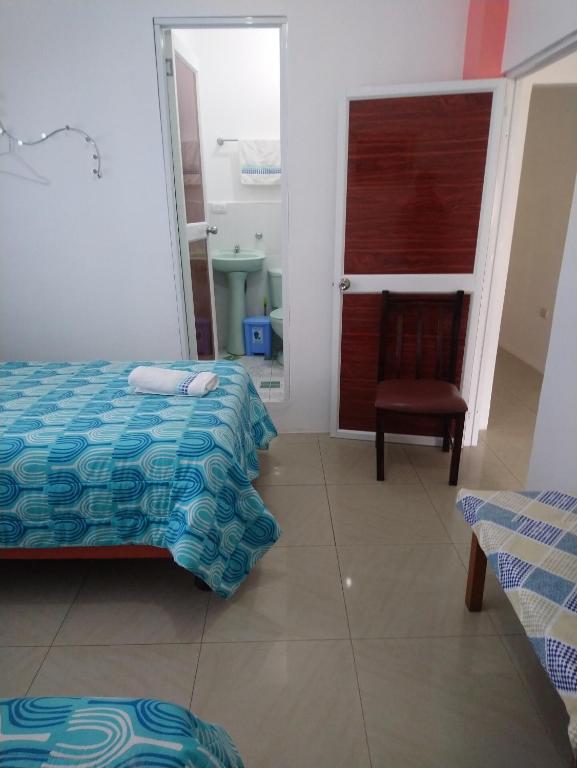Postel nebo postele na pokoji v ubytování Hostal Terito