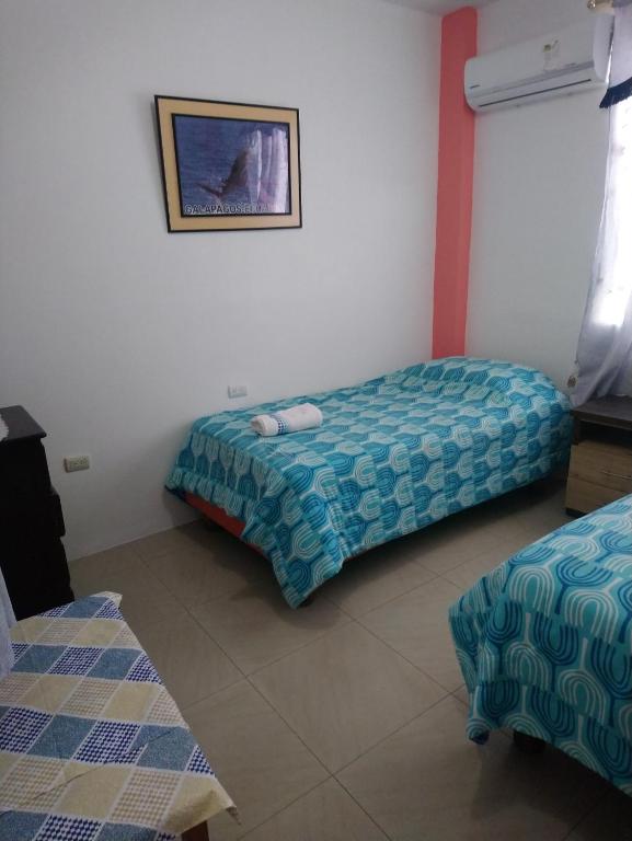 Postel nebo postele na pokoji v ubytování Hostal Terito