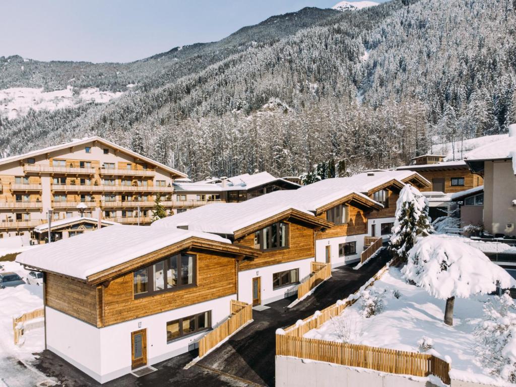 - Vistas al invierno de un lodge con techos nevados en Alp Apart, en Oetz