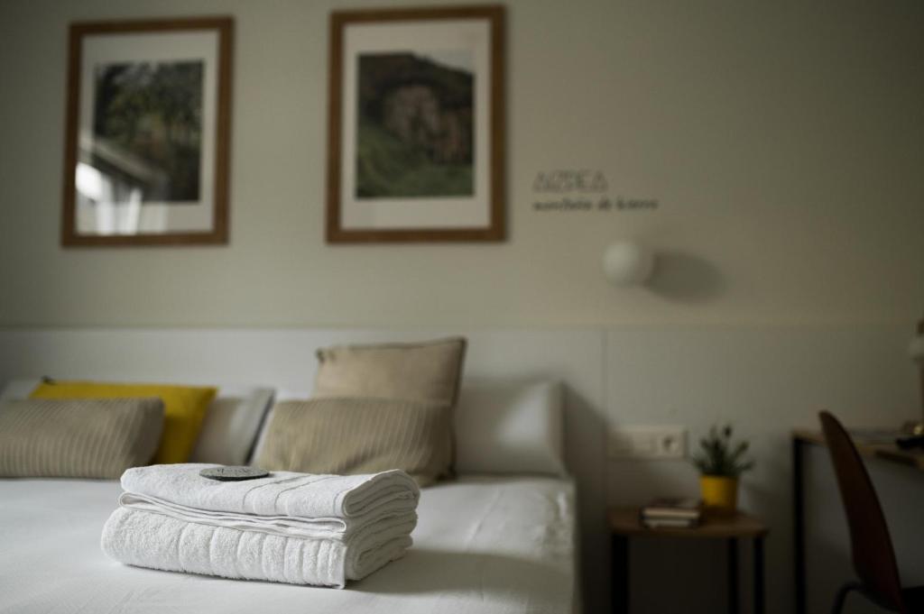 Postel nebo postele na pokoji v ubytování HOTEL ORDIZIA