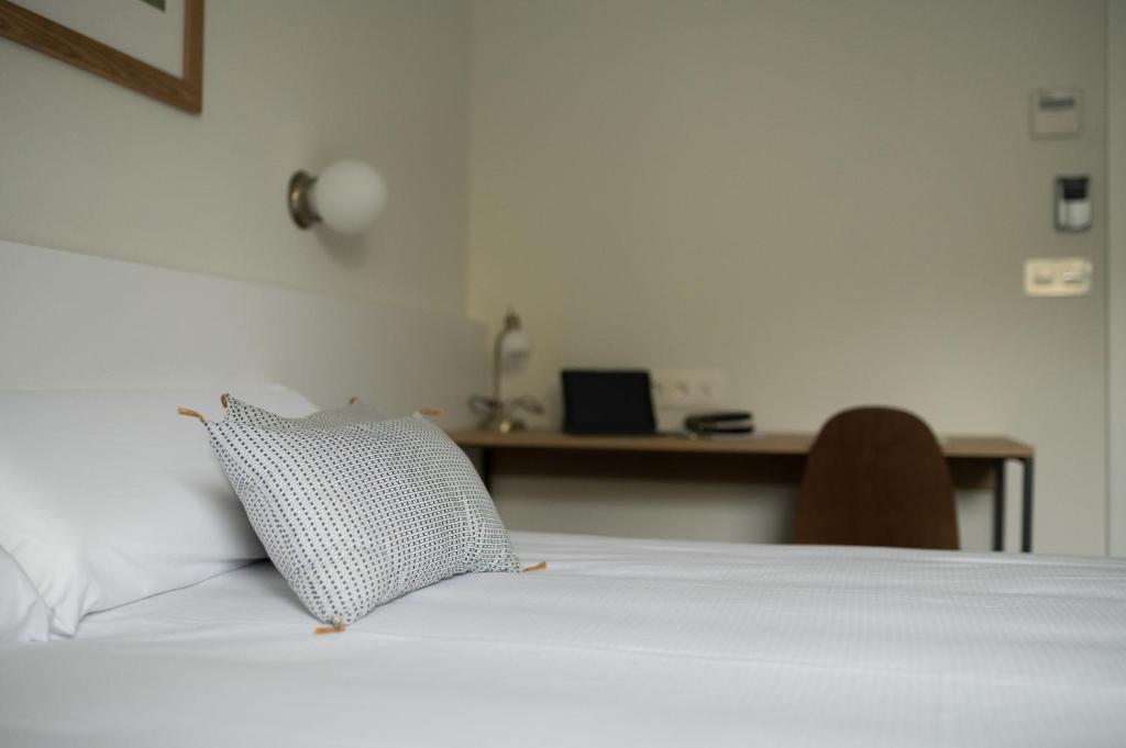 Postel nebo postele na pokoji v ubytování HOTEL ORDIZIA