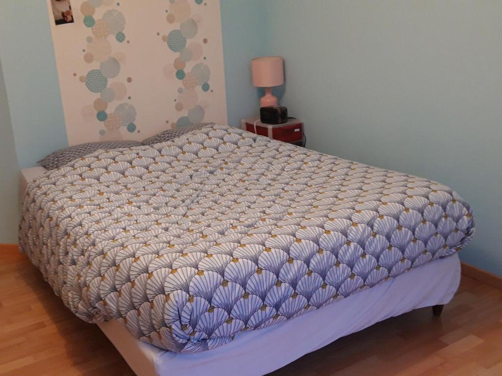 Кровать или кровати в номере La maison de Mathilde