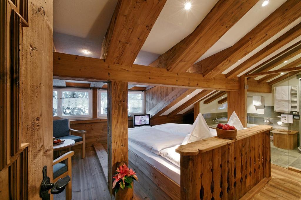 Postel nebo postele na pokoji v ubytování Lifestyle & Spa Hotel Grächerhof