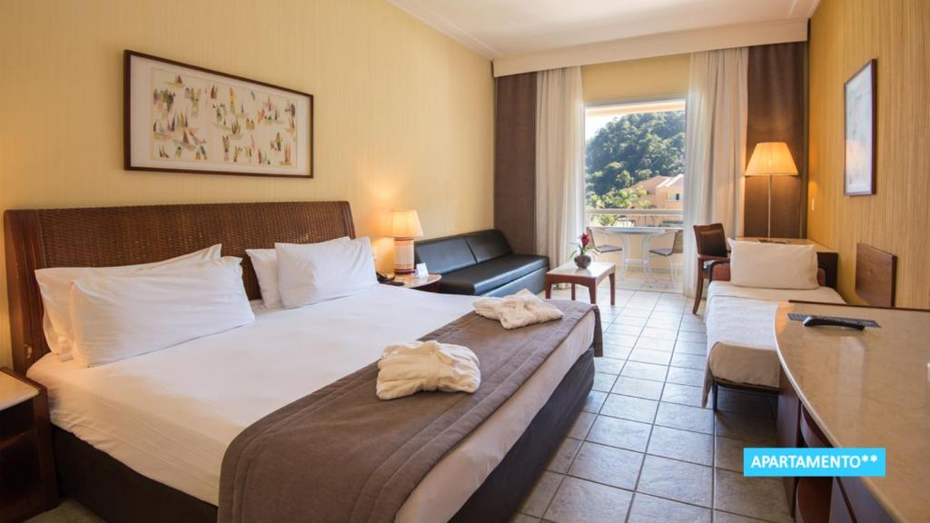 Cama ou camas em um quarto em Vila Galé Eco Resort Angra - All Inclusive