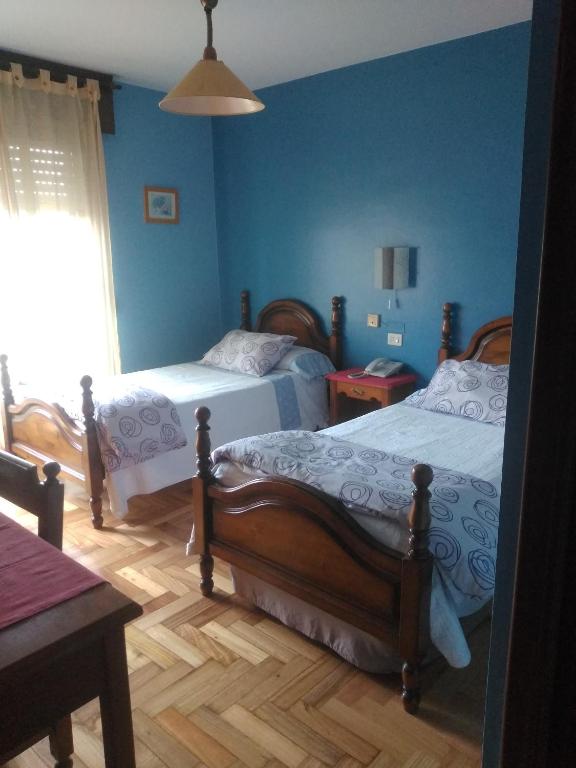 Łóżko lub łóżka w pokoju w obiekcie Hotel Solpor