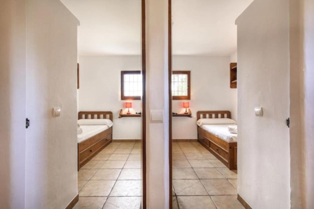 Postel nebo postele na pokoji v ubytování Villa Dalt S Era