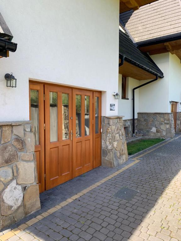 Exteriér alebo vchod do ubytovania Apartamenty Tomalówka Koscielisko