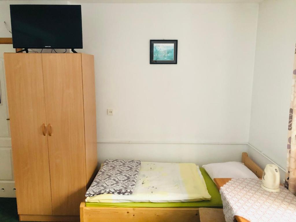 Łóżko lub łóżka w pokoju w obiekcie U Sobali