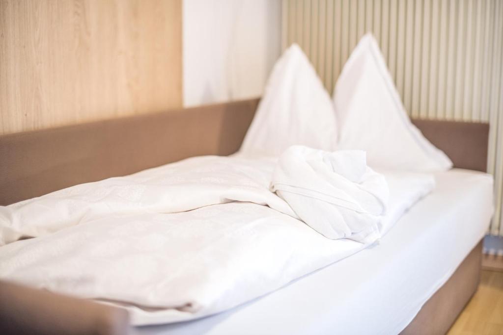 Postel nebo postele na pokoji v ubytování Apartments Heidenberger Fienili