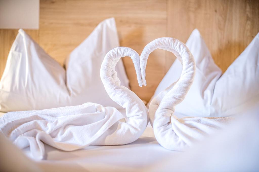 Postel nebo postele na pokoji v ubytování Apartments Heidenberger Fienili