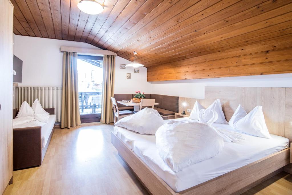 Postel nebo postele na pokoji v ubytování Apartments Heidenberger Fienili
