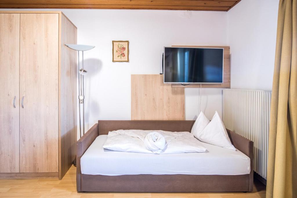 Postel nebo postele na pokoji v ubytování Apartments Heidenberger Fienili