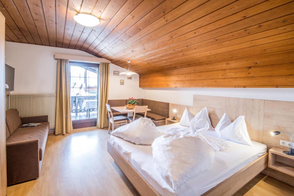 Postel nebo postele na pokoji v ubytování Apartments Heidenberger Fienili