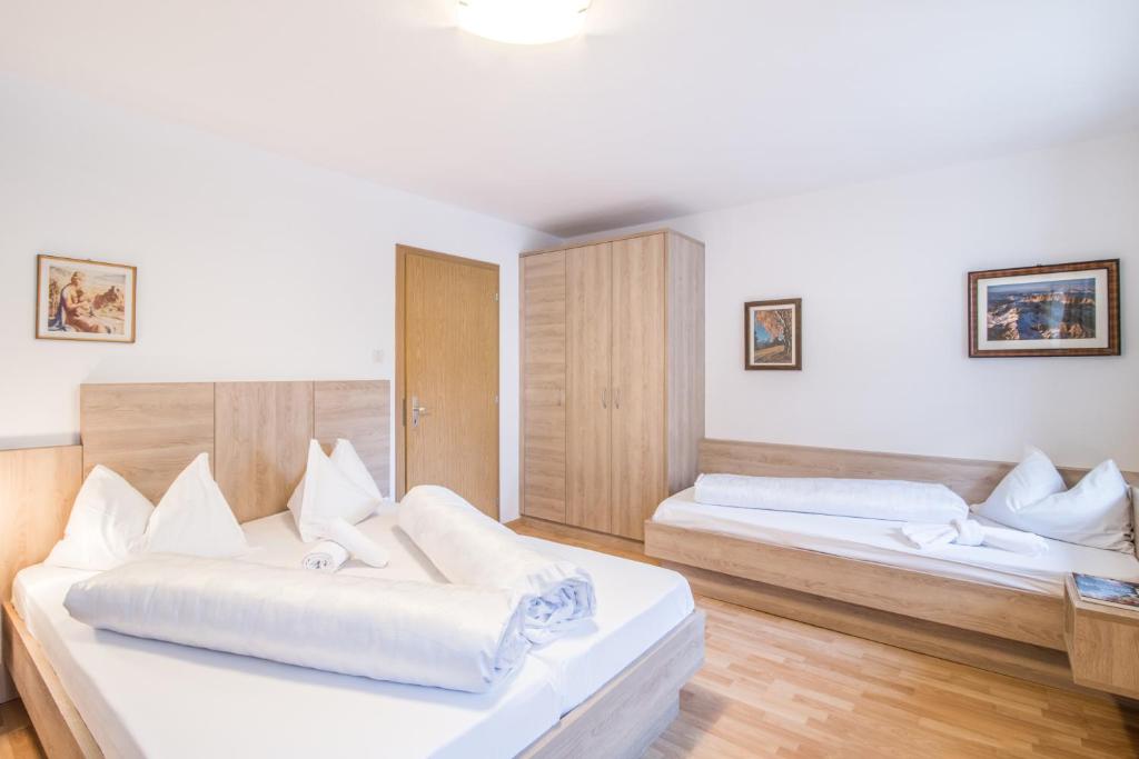 Postel nebo postele na pokoji v ubytování Apartments Heidenberger Fienili