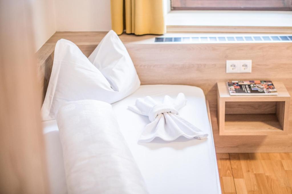 Postel nebo postele na pokoji v ubytování Apartments Heidenberger Fienili