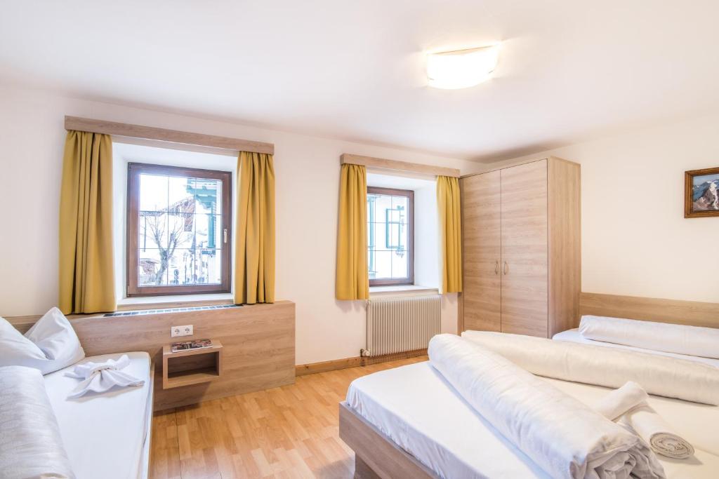 Postel nebo postele na pokoji v ubytování Apartments Heidenberger Fienili