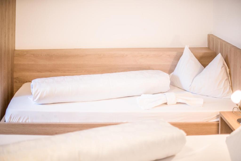 Postel nebo postele na pokoji v ubytování Apartments Heidenberger Fienili