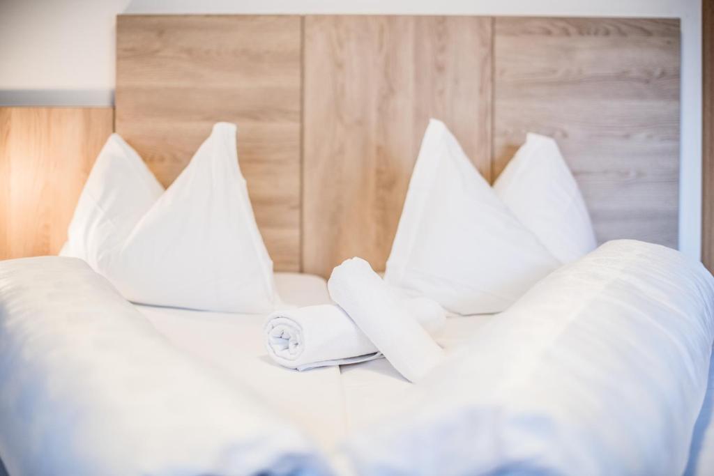 Postel nebo postele na pokoji v ubytování Apartments Heidenberger Fienili