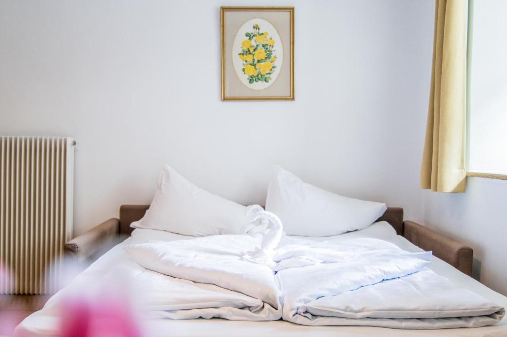 Postel nebo postele na pokoji v ubytování Apartments Heidenberger Fienili