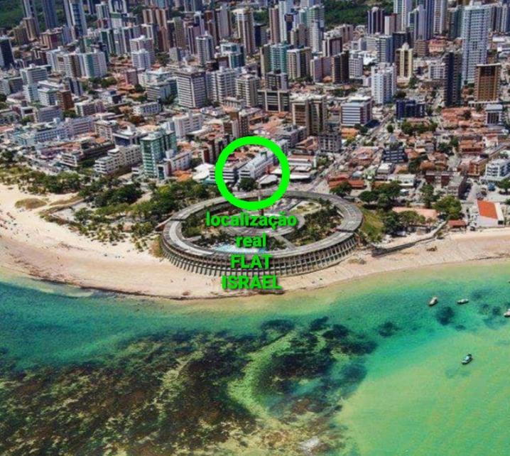 an aerial view of a beach in front of a city at BOUTIQUE FLAT ISRAEL no melhor de JAMPA in João Pessoa