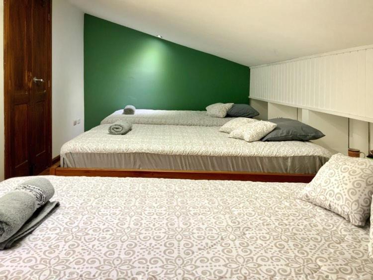 Postel nebo postele na pokoji v ubytování Ñañas Hostel
