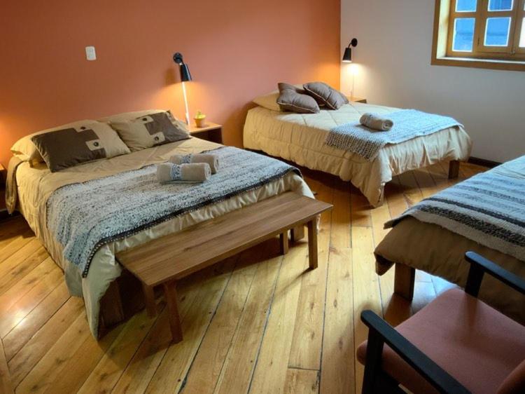 Postel nebo postele na pokoji v ubytování Ñañas Hostel