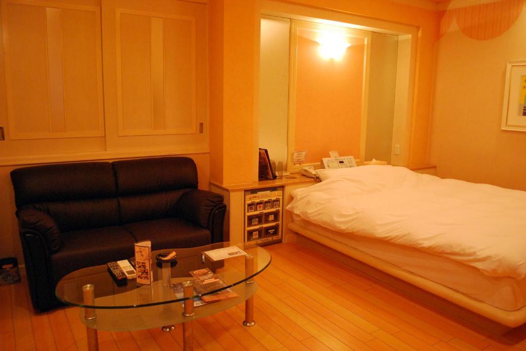 Postel nebo postele na pokoji v ubytování Ena Hotel Venus