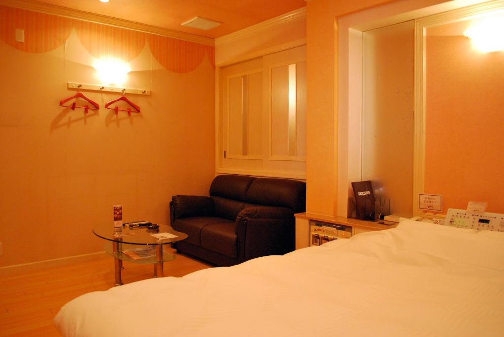 Postel nebo postele na pokoji v ubytování Ena Hotel Venus