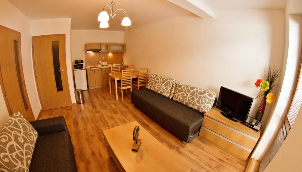 TV a/nebo společenská místnost v ubytování Holiday Resort Telgárt