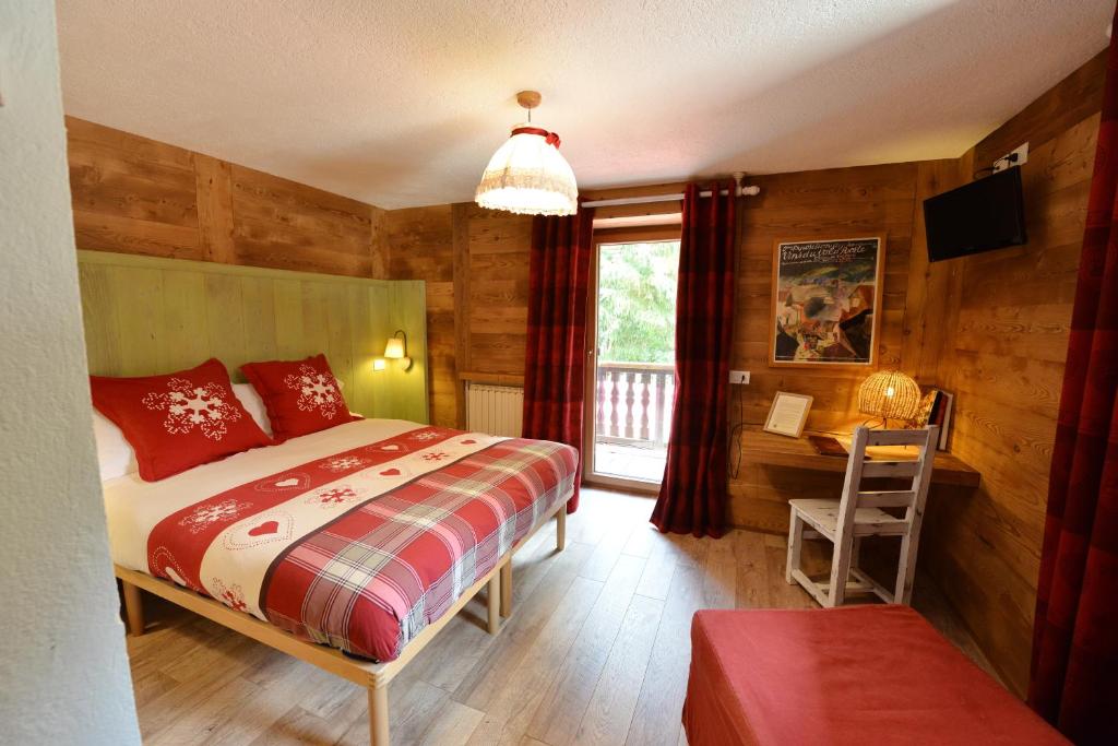 Postel nebo postele na pokoji v ubytování Hotel Petit Dahu - Chambres et Restaurant