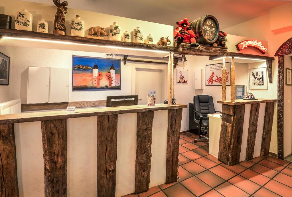 Kuchyň nebo kuchyňský kout v ubytování Hotel-Restaurant Hackteufel