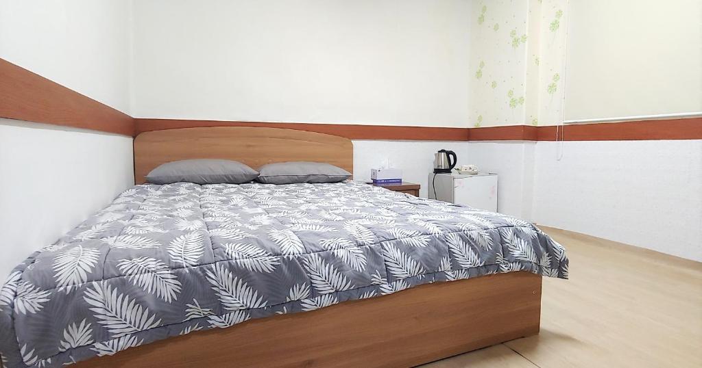 Postel nebo postele na pokoji v ubytování Healinghouse Peakjang