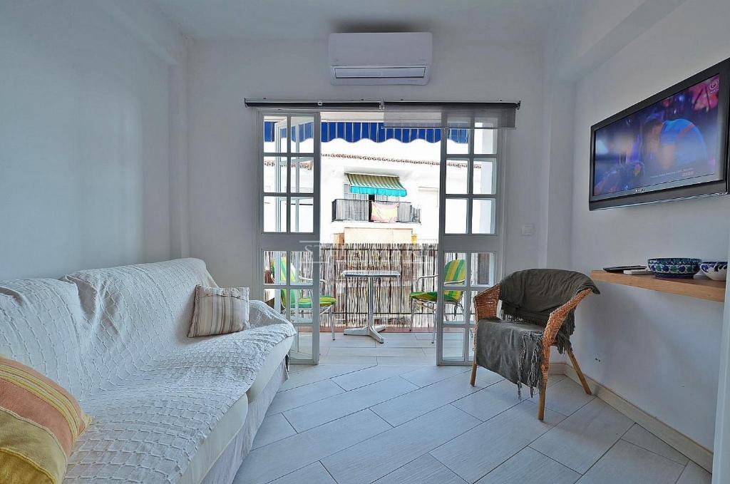 TV a/nebo společenská místnost v ubytování bright central apartment