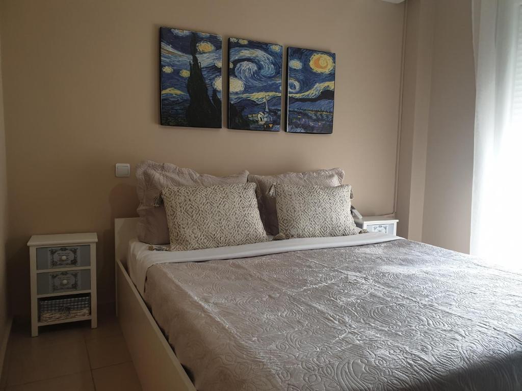 Postel nebo postele na pokoji v ubytování Eri Apartment