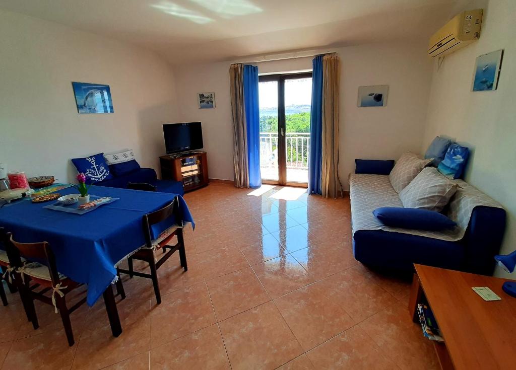 Telewizja i/lub zestaw kina domowego w obiekcie Apartment RB