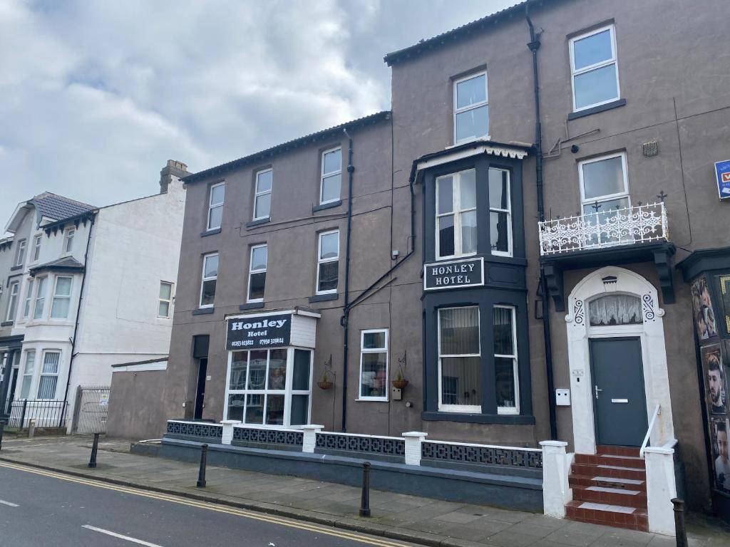 a building on the side of a city street at The Honley hotel in Blackpool