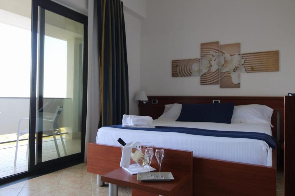Postel nebo postele na pokoji v ubytování Park Hotel Mirabeau
