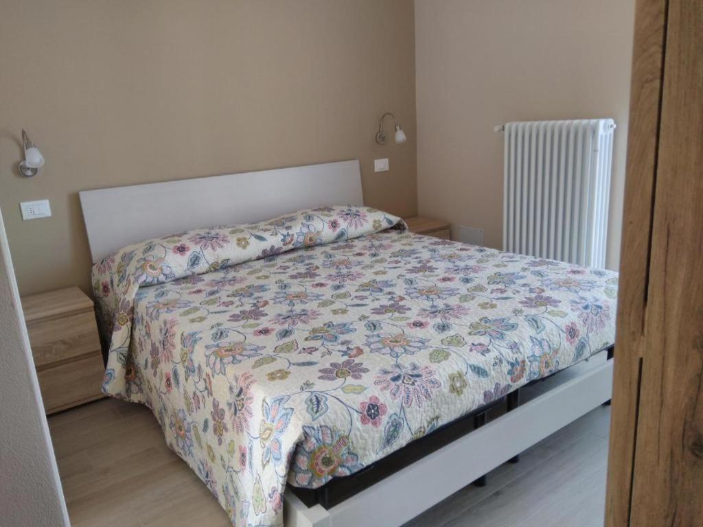 Postel nebo postele na pokoji v ubytování Danilo Apartments