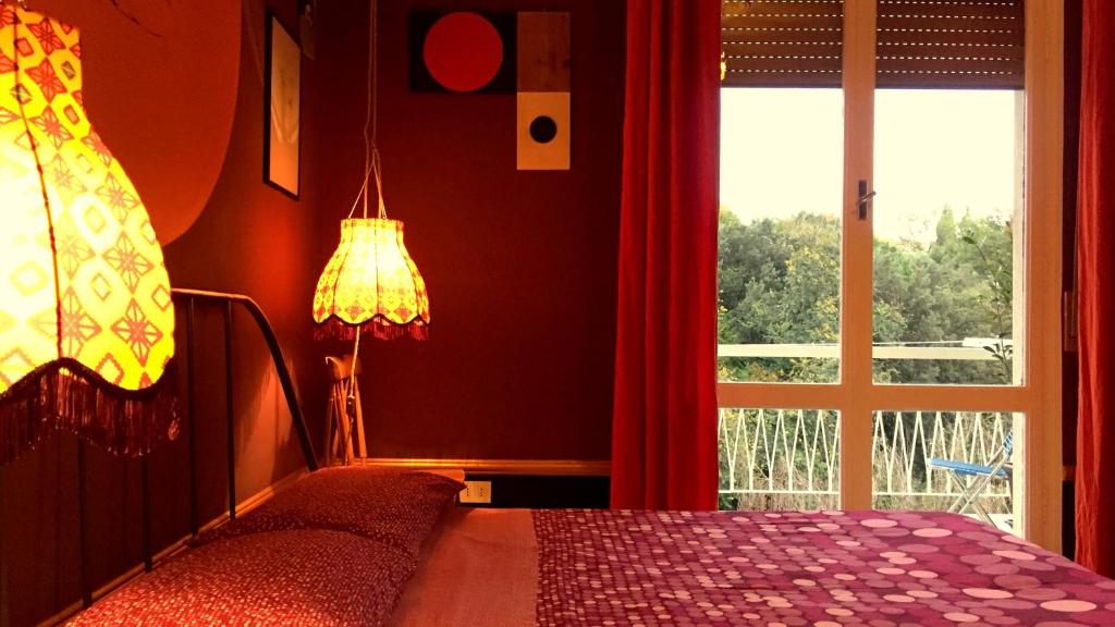 A bed or beds in a room at Domus LouLou