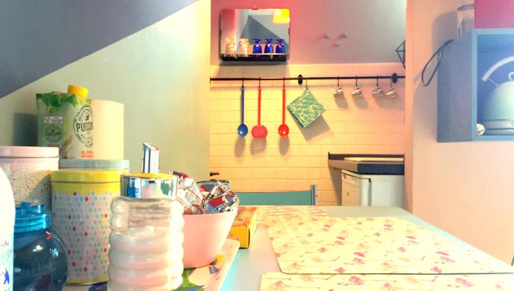A kitchen or kitchenette at Domus LouLou