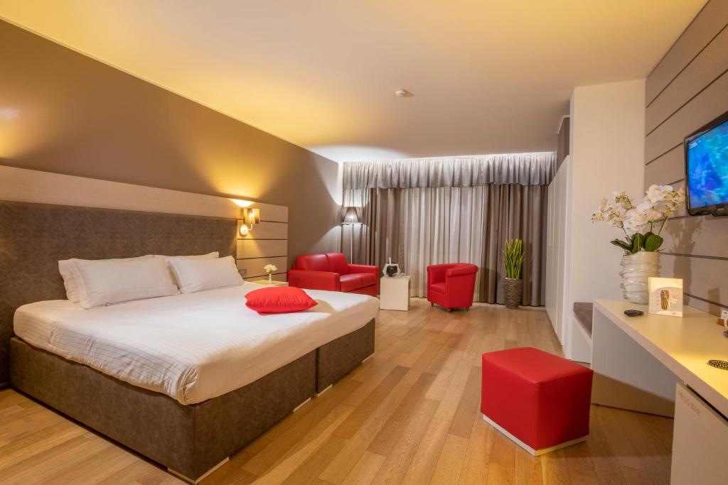 Postel nebo postele na pokoji v ubytování Hotel Glamour