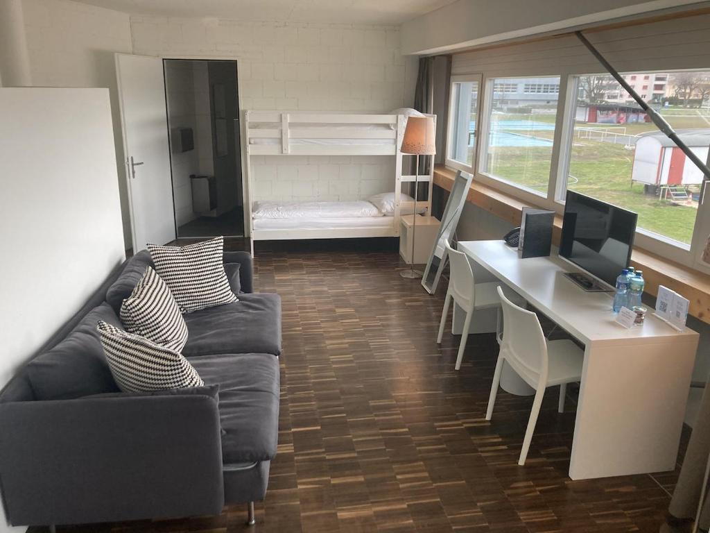 Una cama o camas en una habitación de Omnium Sport Hotel