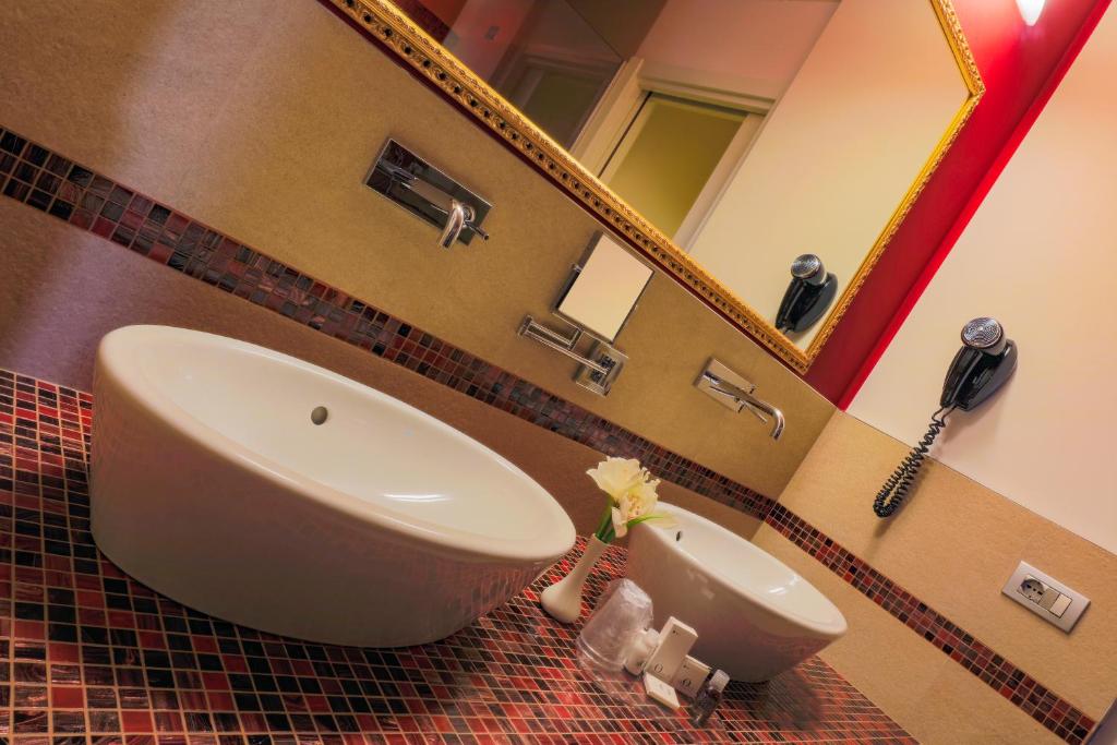 Koupelna v ubytování Hotel Glamour