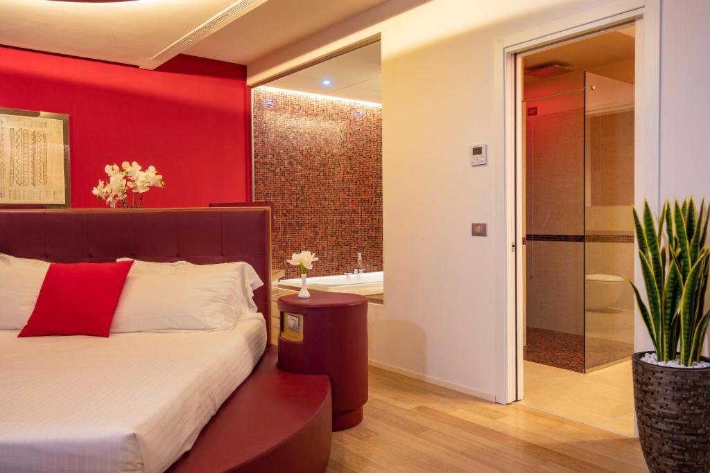Postel nebo postele na pokoji v ubytování Hotel Glamour