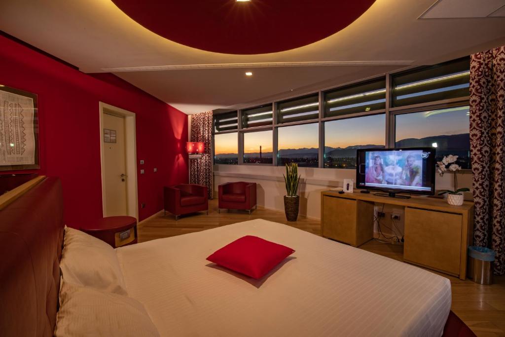 Postel nebo postele na pokoji v ubytování Hotel Glamour
